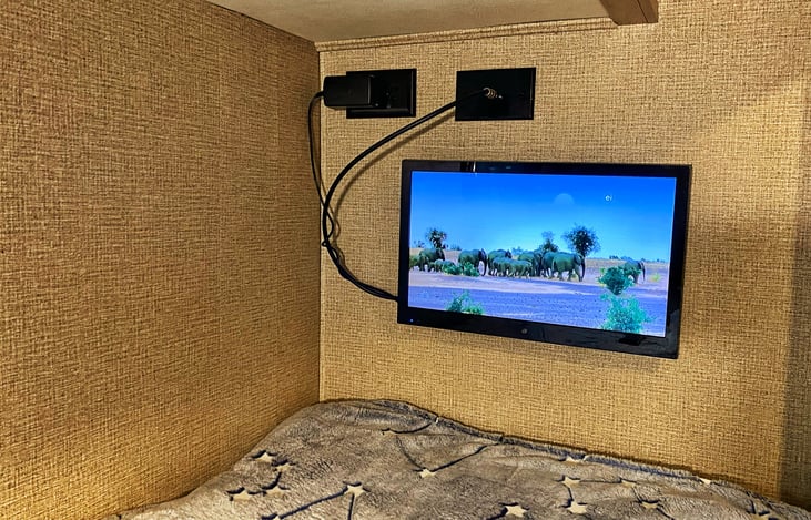 Each bunk bed has its own TV