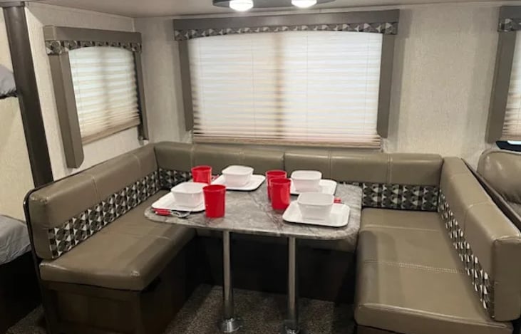 Large seating area around dinette.