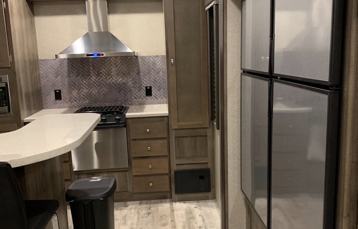 Kitchen with dual refrigerators