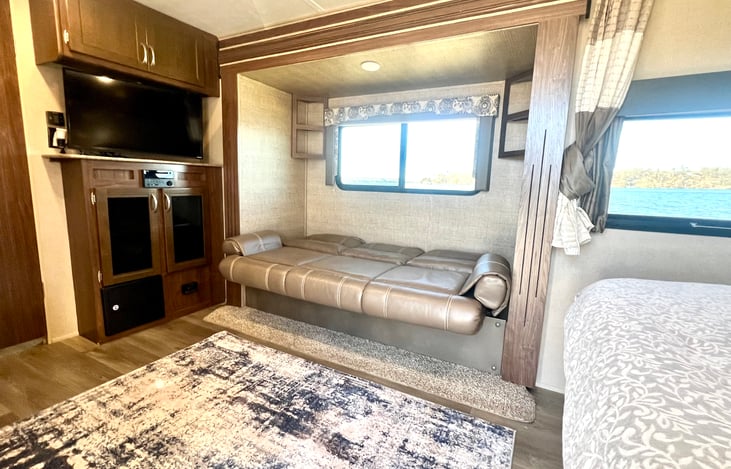 The couch lays flat to turn into a nice size bed for two children or one adult. Sheets/pillows/blankets provided.