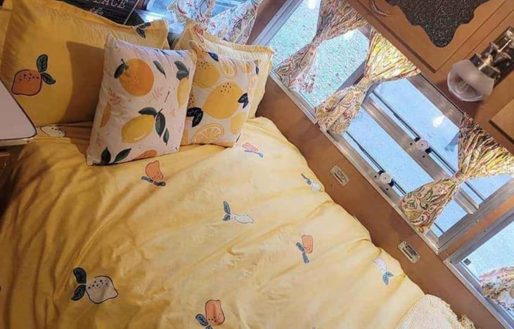 permanent bed in the previous dining area - makes it a easy no set up process for you!