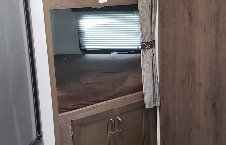 Oversized bunks can sleep two people each.