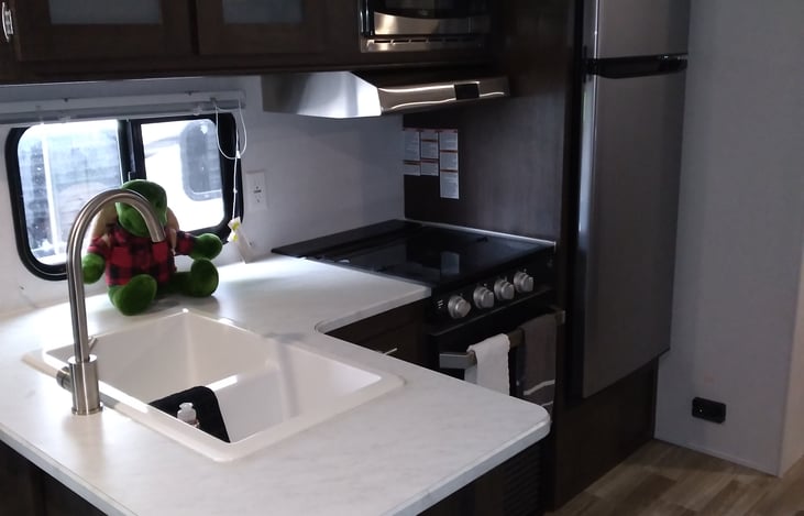 Great size fridge, microwave, and 3 burner stove....(please note: NO oven)