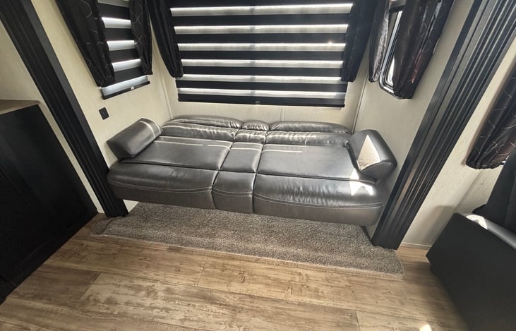 Sofa 2  in the living area that folds out to full size bed