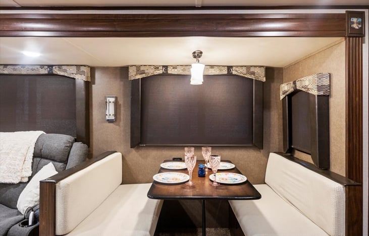 Dinette seating area folds down for a 3rd sleeping area.