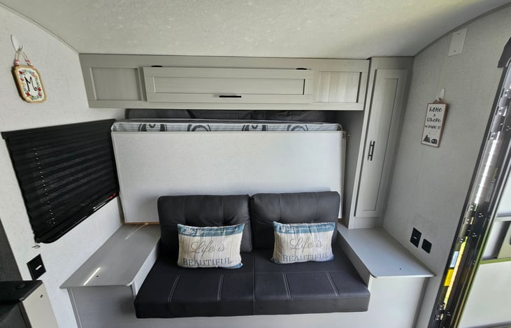 Living room area convert in a queen bed