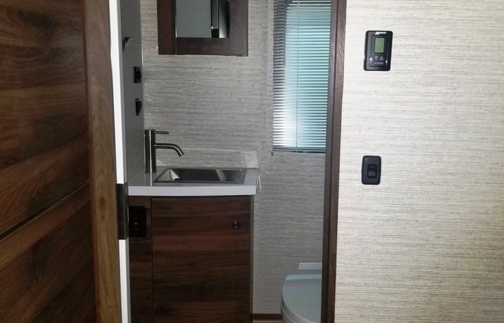Separate bathroom, sink, stool, shower, medicine cabinet & closet