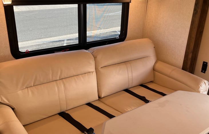 Have dinner while sitting on the couch at this removable table, than pull our the couch for a nap!