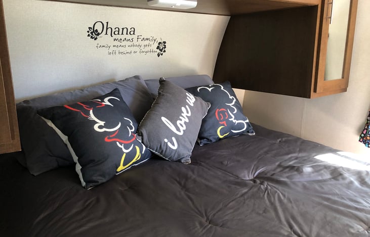 If your vertically challenged like myself you’ll appreciate the stool and ‘light’ stick provided to reach the light OVER the bed. Careful- since this is an upgraded size it is a bit narrow to access