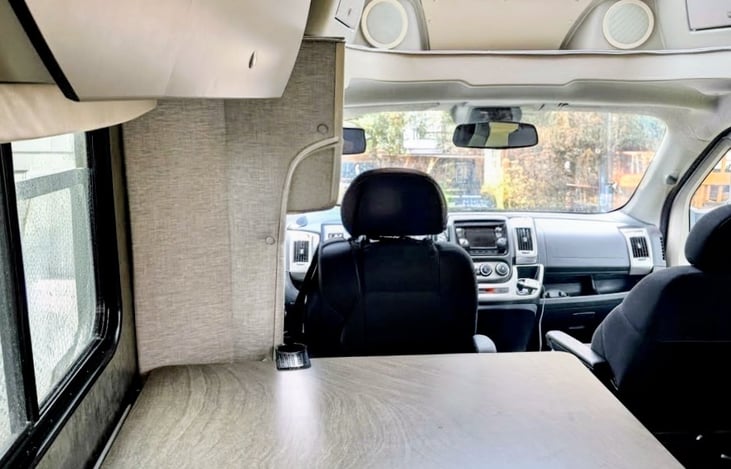 View from the dinette bench seat. Play games or eat a meal while cruising around, while you enjoy the views out of the large window.