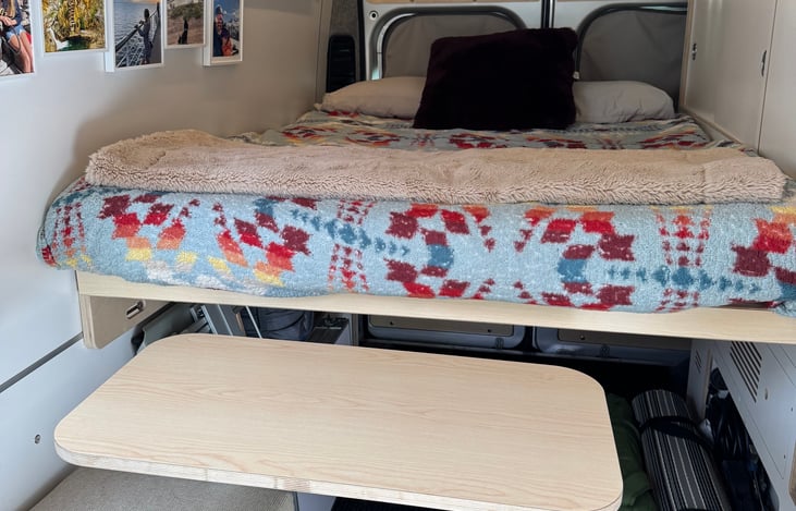 Table swivels under bed when not in use