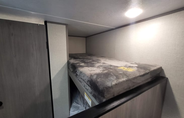 Doubled up memory foam mattress's on both bunks in back