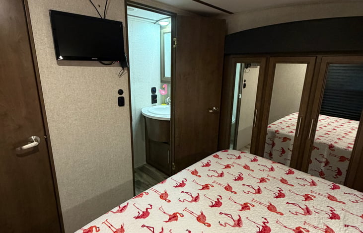 Master bedroom has a private half bath