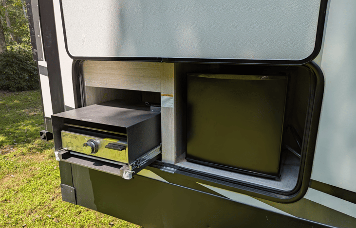 Outdoor griddle to cook your favorite meals outside while the fridge keeps your favorite beverages cold. Outdoor speakers play your favorite tunes.