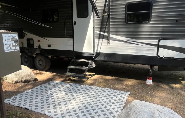 Woven rug for use outside the RV can help reduce dust. Also a great area rug for babies to use outside on the ground.