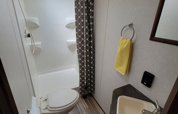 large walk in shower there is also an outdoor shower