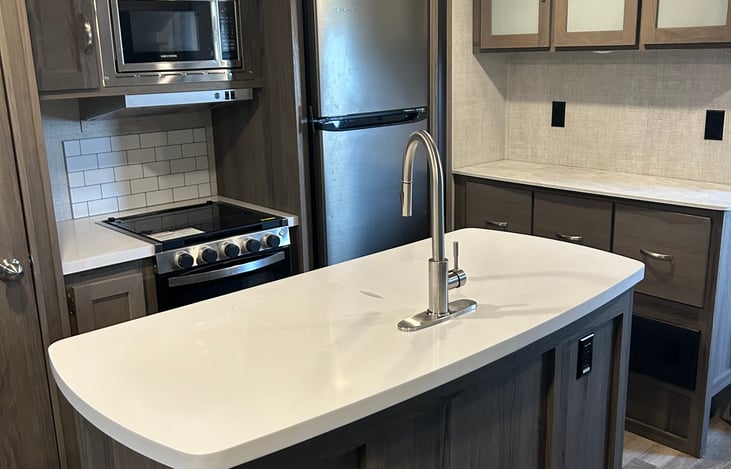 Kitchen island with sink.