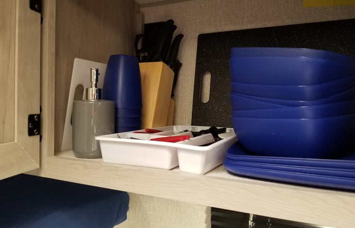 Silverware, Knife Set, plates, bowls, drinking cups,
cutting board, soap dispenser