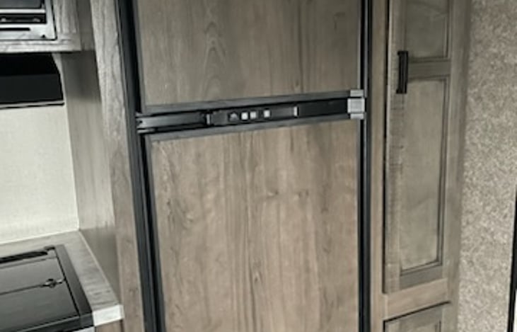 refrigerator runs on electric or gas