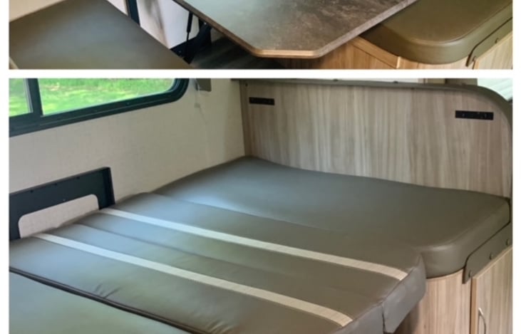 Table converts into ~full size bed. Linens provided.