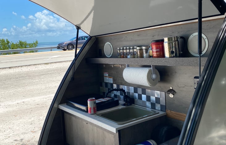 enjoy making your favorite camping meal with soothing music too.