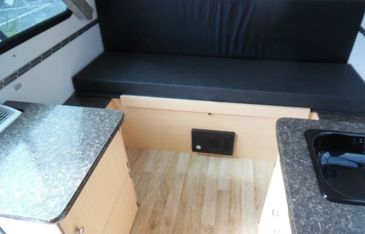 Sofa that converts into a full+ bed. (stock photo)