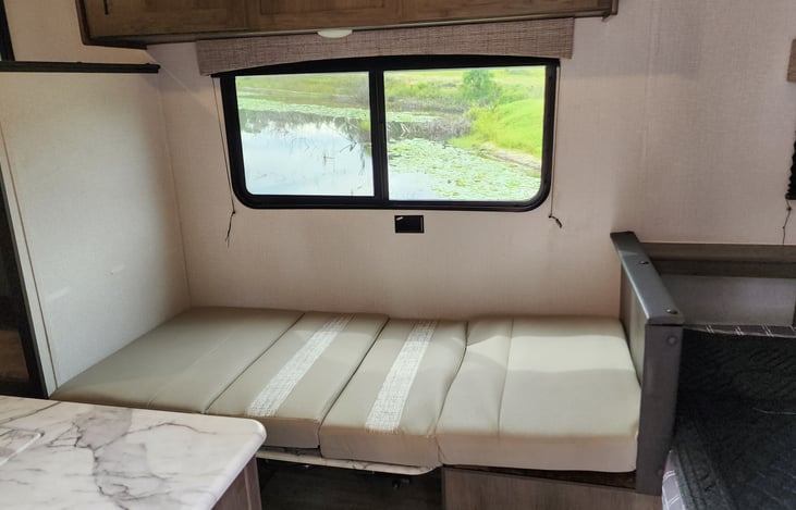 Kitchen table turns into a 4th bed