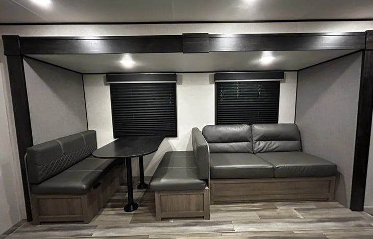 Dinette and jackknife sofa (both convert to sleeping spaces)