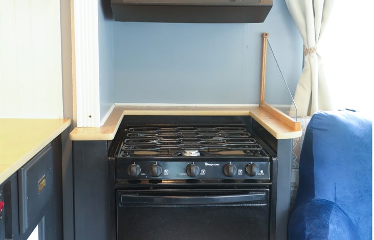3 burner gas stove + oven and a microwave