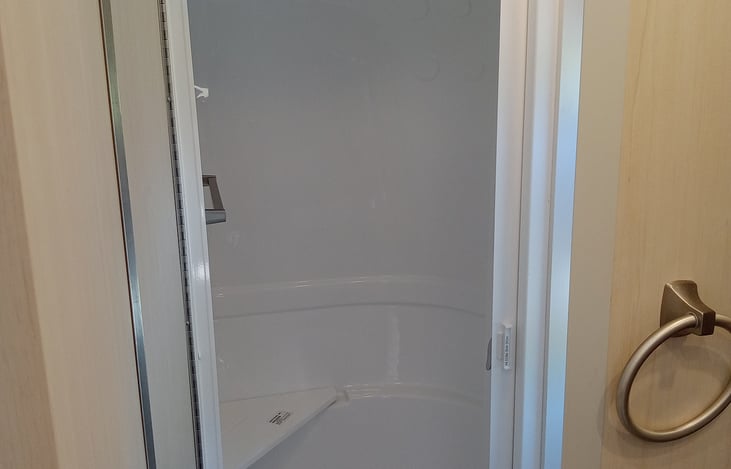 Inside shower which we have never used. We shower at campgrounds or just jump in a lake. We have a separate outside shower also for a quick refresher.