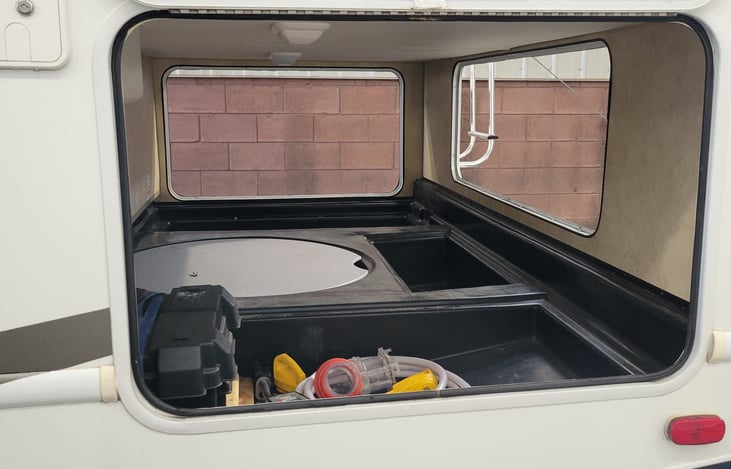 Exceptionally large storage area underneath. 
You can bring along everything but the kitchen sink (it is already included)