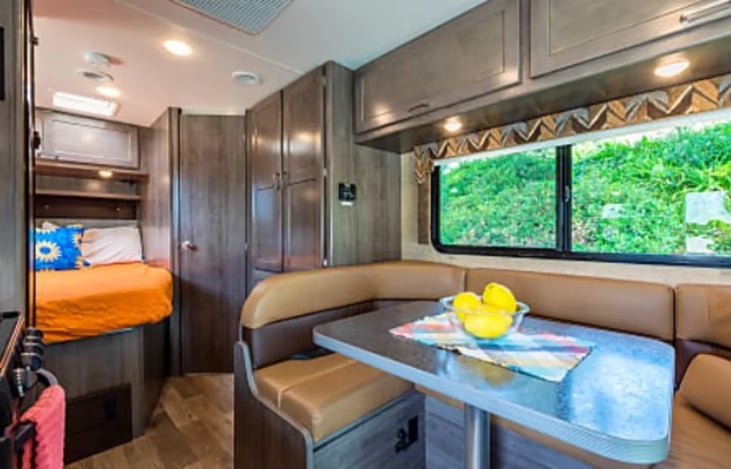 The u-shaped dinette is perfect for meals or games!