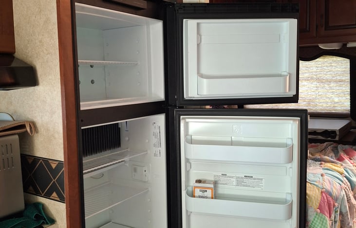 NEW mid size refrigerator