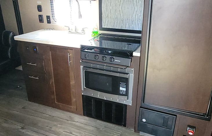 Convection microwave and has stove