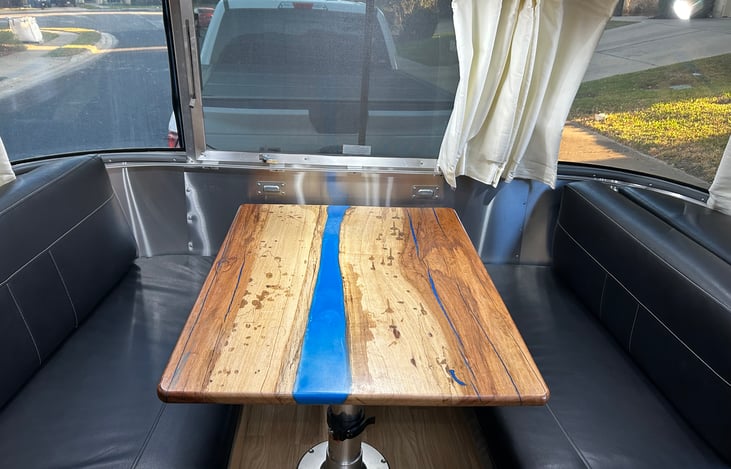 Just updated the table to be pecan hardwood table, 3 stage air spring marine table leg make the table very stable and useful.