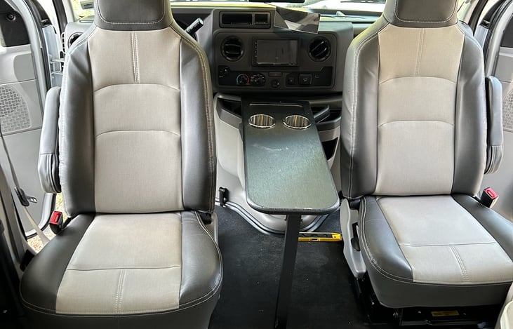 Cab seats turn 180 degrees for additional seating when parked.