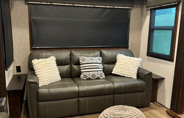 Living room w/ sleeper sofa, linens included