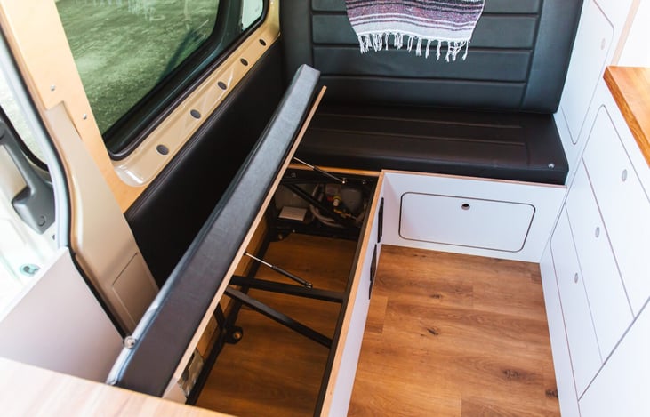 Storage under both bench seats. Seatbelts for 4 in the back.