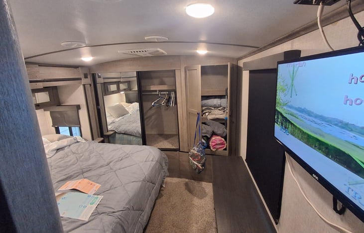 Huge hangup closet and cupboard for extra bedding.