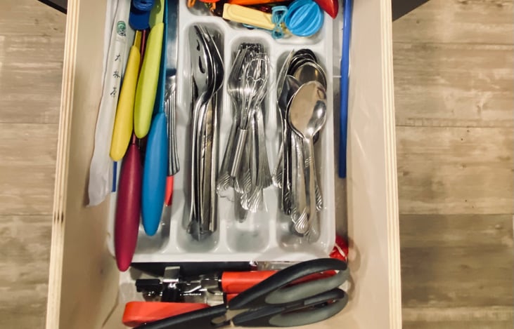 Drawer 1: Stocked with silverware, cutlery, shears, a can opener, and yes, we've even included chopsticks!!