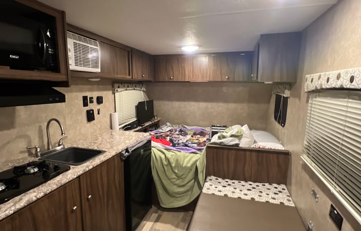 Comfortable pillow top mattress, extra bed for a friend or two. Microwave, plus air fryer/ mini bake oven (fits store pizza)! Don’t forget the A/C and have fans.