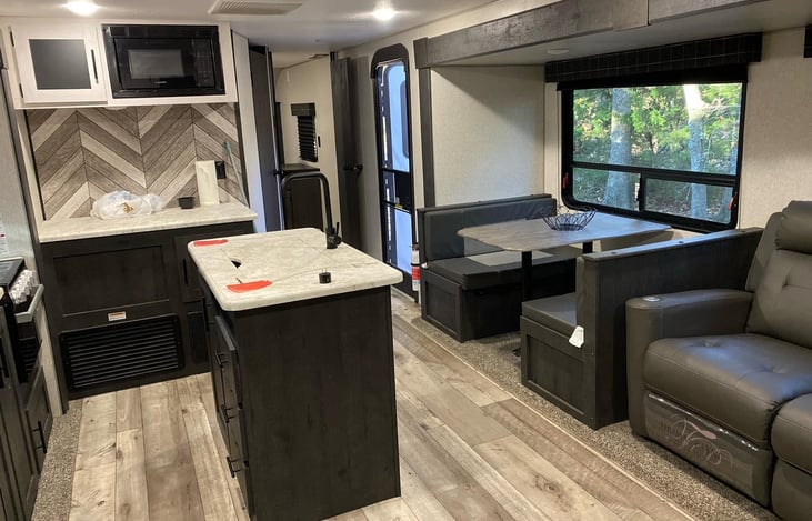 COUCH IS HEATED AND HAS MASSAGERS.  VERY SPACIOUS WITH 3 SLIDE OUTS