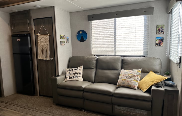 Living room, pantry, fridge, reclining sofa