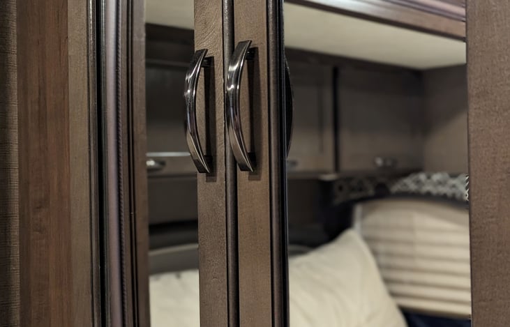 large, mirrored closet with lots of storage space for suitcases, duffel bags etc. We highly recommend hanging packing cubes!