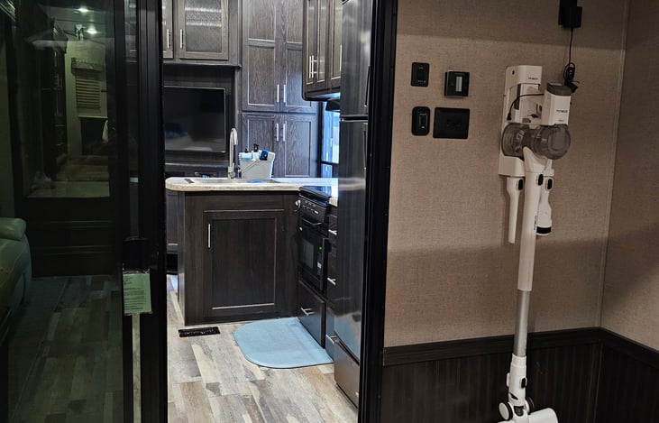 Rear bedroom/garage looking into the main living area.