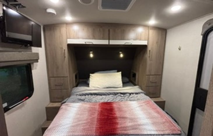 Rear sleep quarters has private entrance as well as doorway from bathroom.