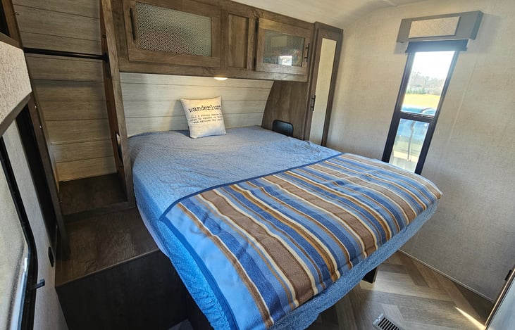 Bedroom | RV Queen | Overhead and side storage | Closet