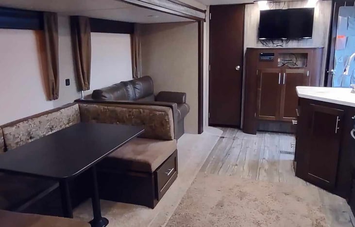 Living area #2.   U-shaped dinette also folds into a bed