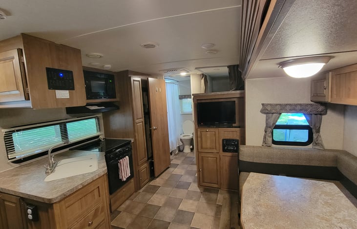 Dining area in slide out, converts to a bed.