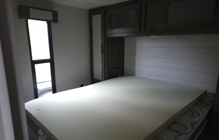 Queen sized bed that sleeps two full sized adults!